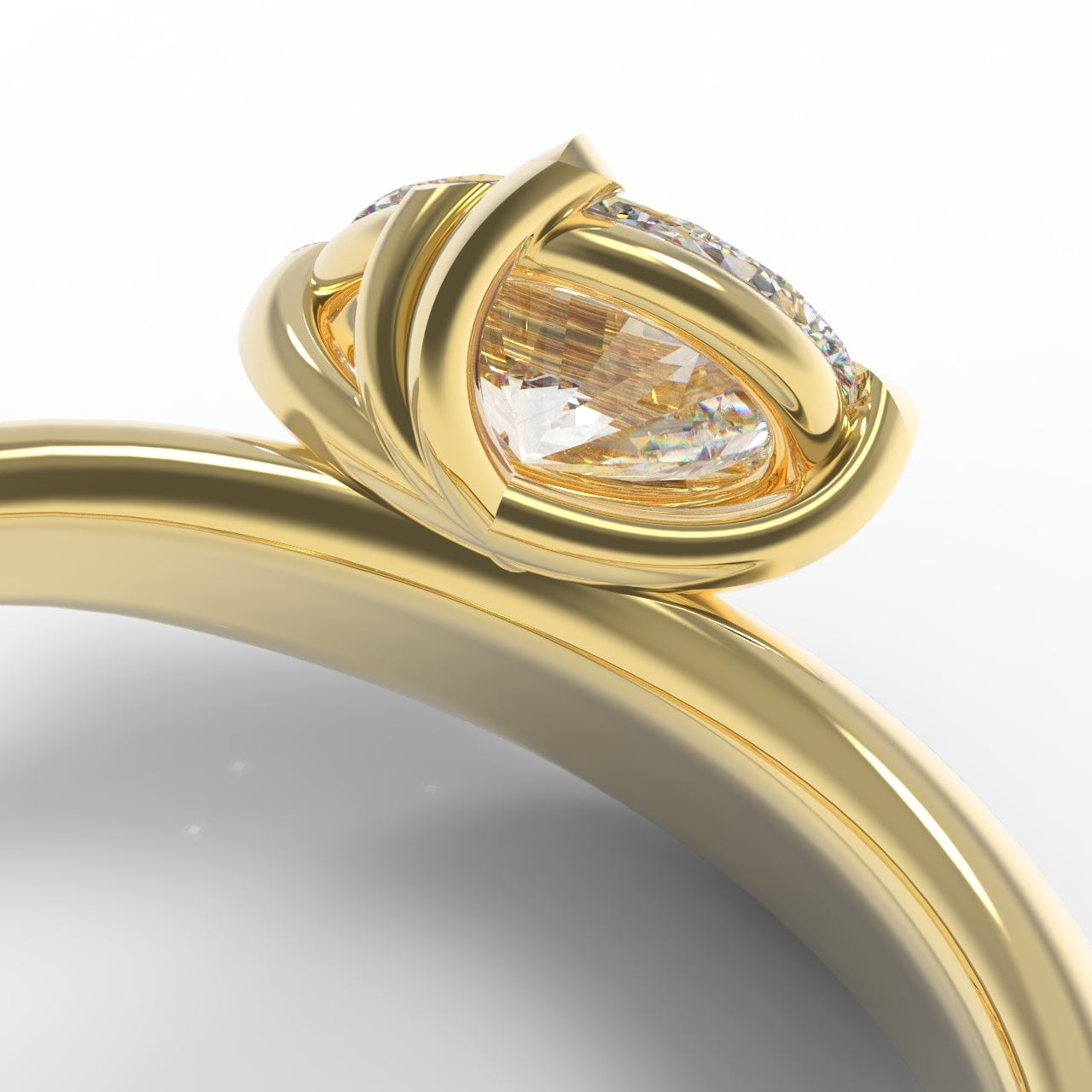Hidden details under the setting of a Large Oval Diamond Ring, with a Wide Yellow Gold Band, with Sculptural Wave details and an East-West setting.