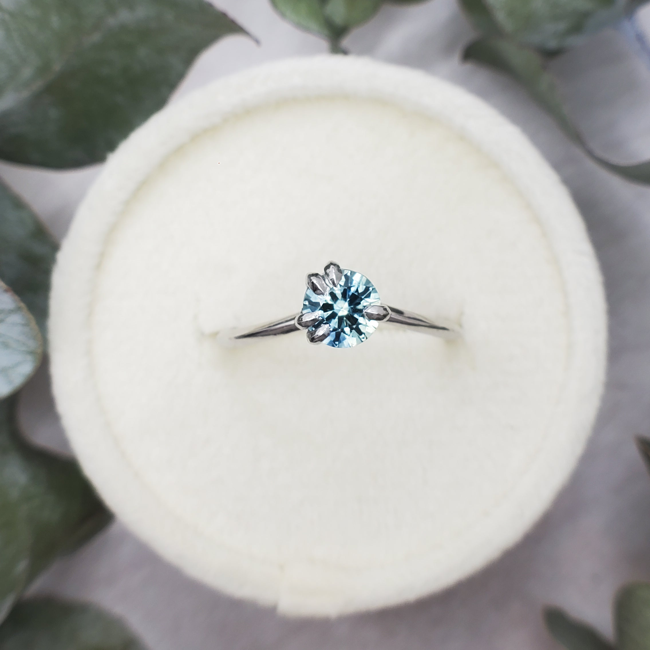 Round Teal Sapphire Engagement Ring. Ethically sourced sapphire from Montana, USA. 