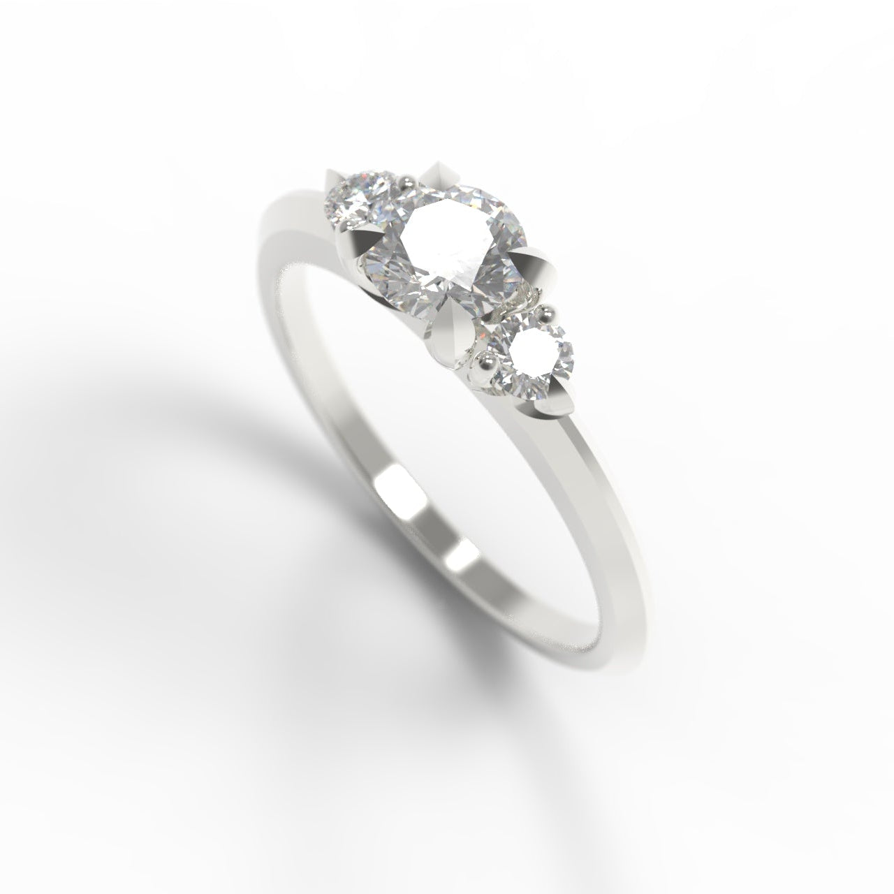 A white gold three-stone diamond ring with a marquise-cut center stone and round side stones, shown on a clean white background with a soft shadow.