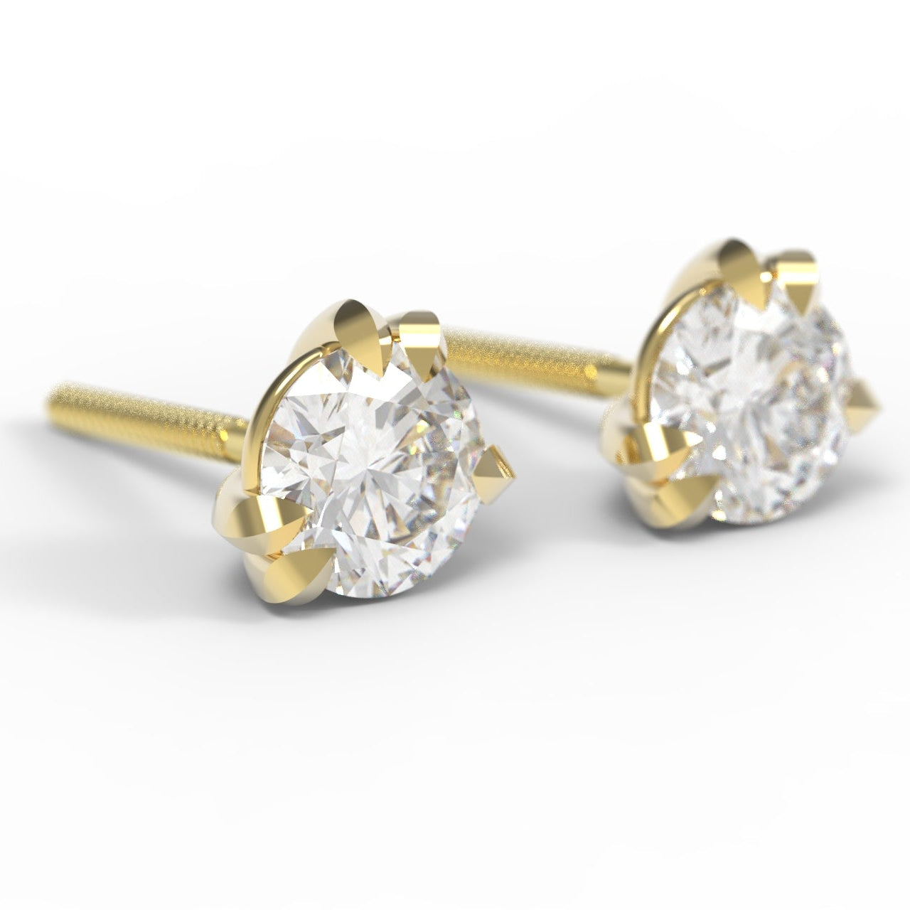 Canadian Diamond and Gold stud earrings on a white background