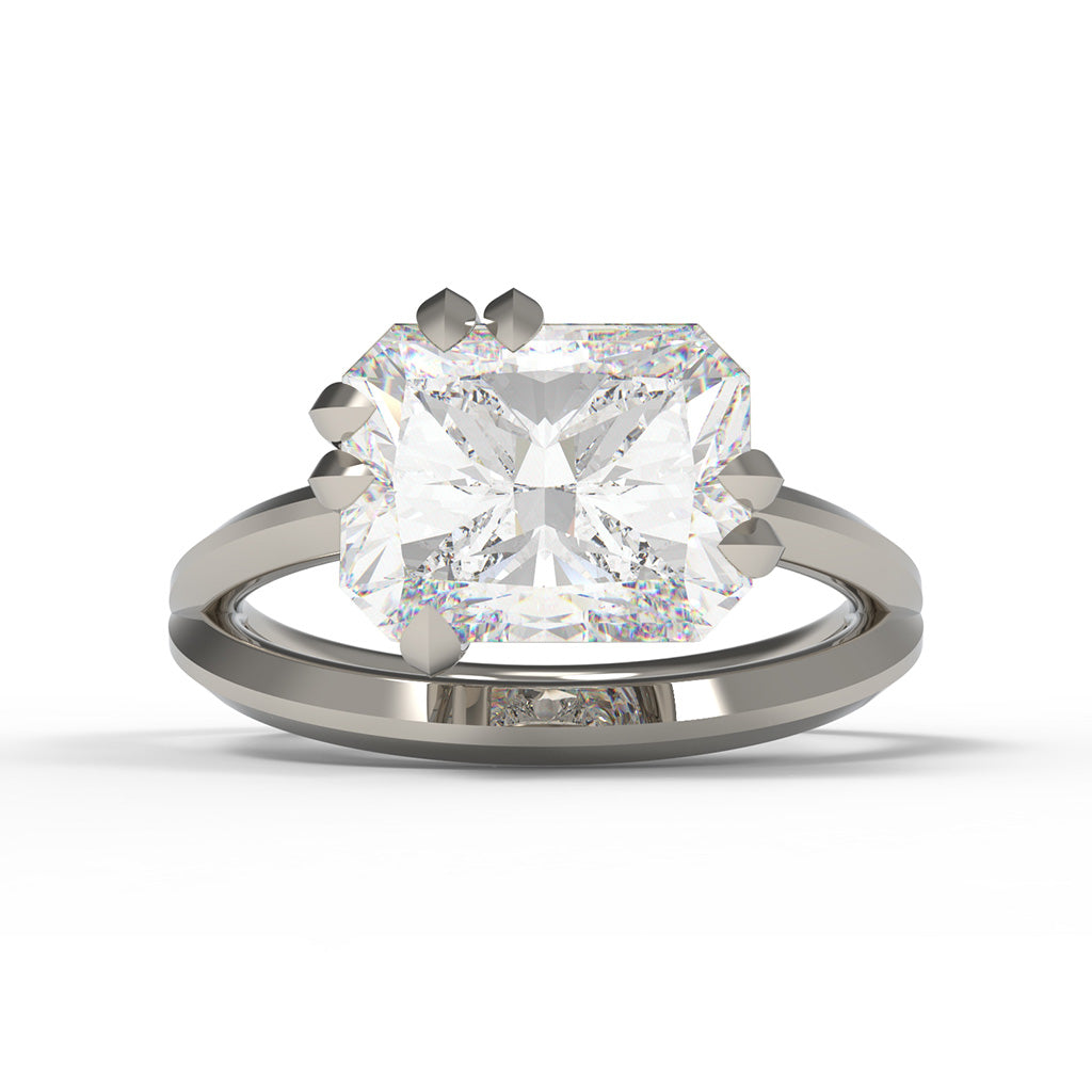 Platinum Engagement ring with a large radiant cut diamond, East-West set in a split band with leaf shaped claw settings.