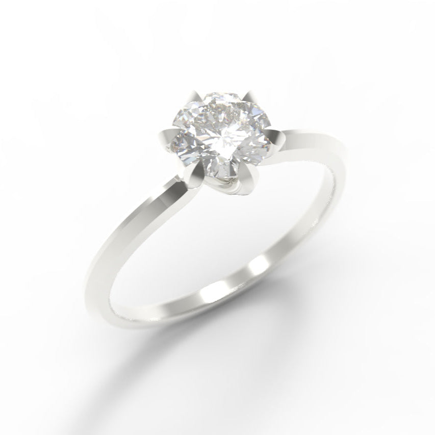 White gold ring with a diamond on a white background