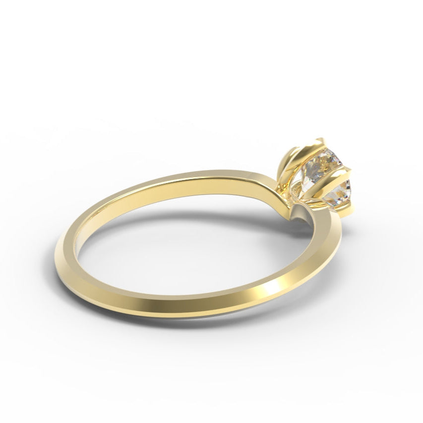 Gold ring with a diamond on a white background