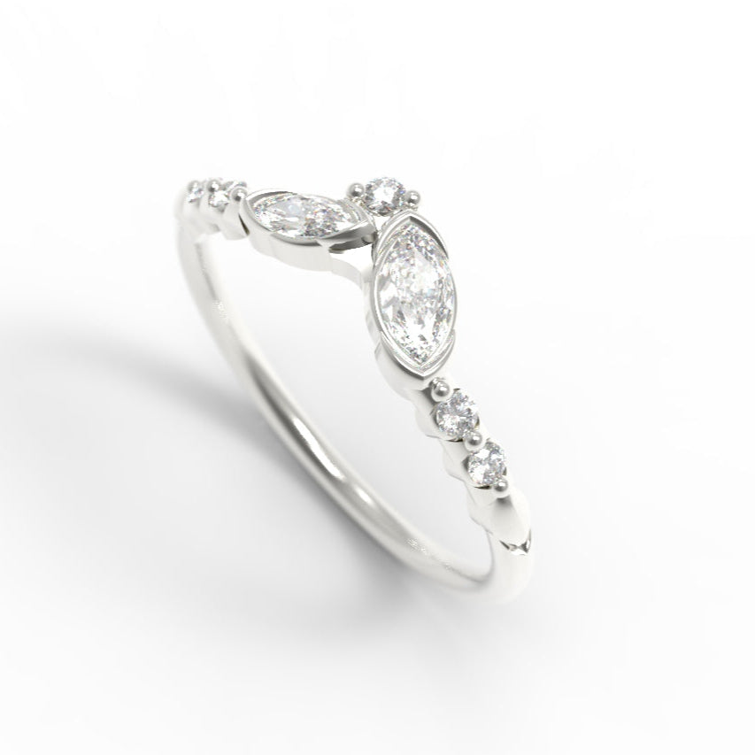 White Gold ring with a marquise shaped diamonds on a white background