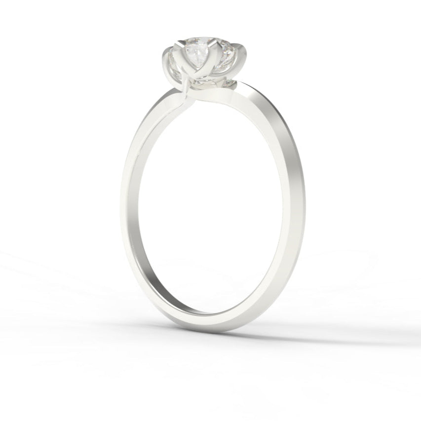 Platinum ring with a diamond on a white background