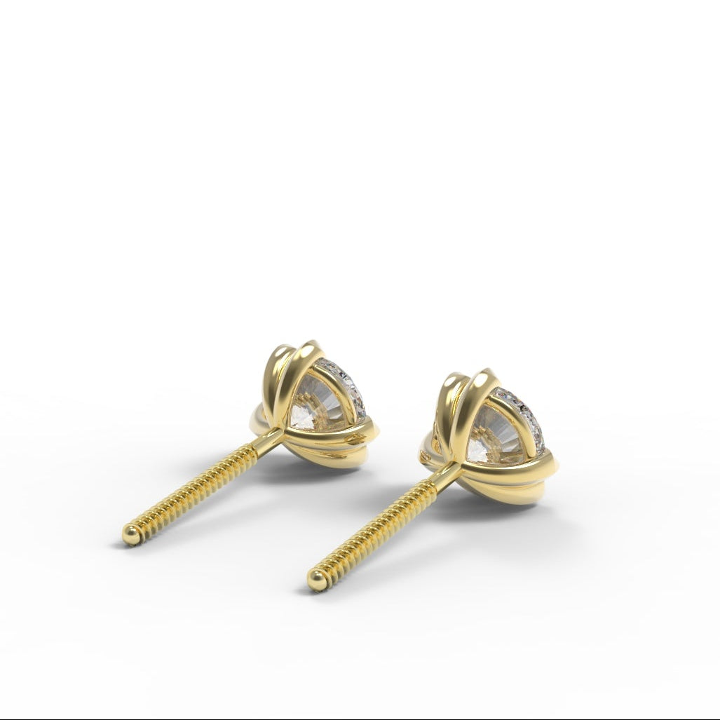 Canadian Diamond and Gold stud earrings on a white background