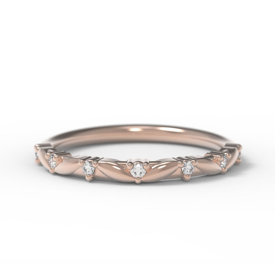 Canadian Diamond wedding band with intricate leaf details on a white background.