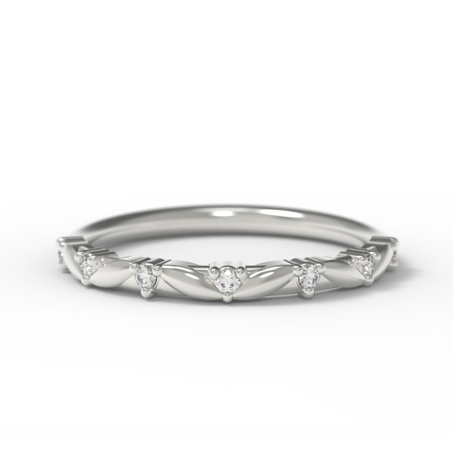 Canadian Diamond wedding band with intricate leaf details on a white background.