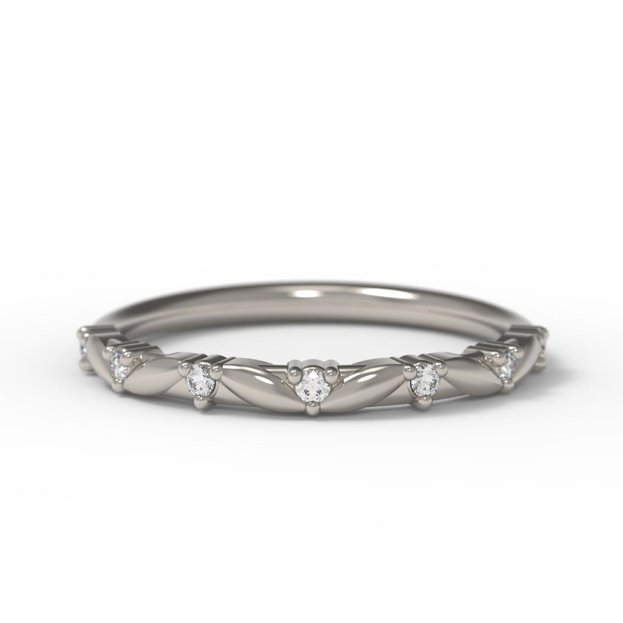 Canadian Diamond wedding band with intricate leaf details on a white background.
