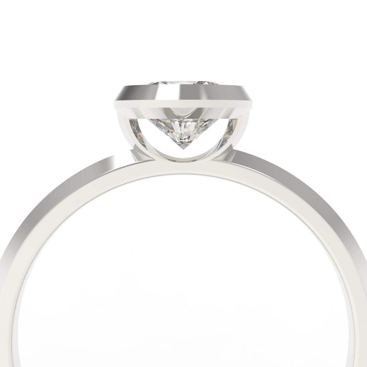 A close-up studio shot of a white gold solitaire ring with a clear gemstone in a prong setting, shown against a plain white background.