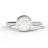 A classic solitaire engagement ring featuring a round brilliant-cut diamond set in a polished white gold band, shown on a clean white background.