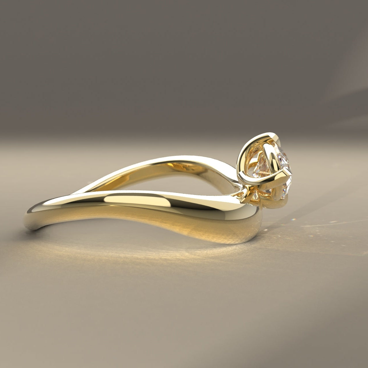 Ethically made Gold ring with a oval Canadian diamond on a light beige surface in reflective spot lighting.