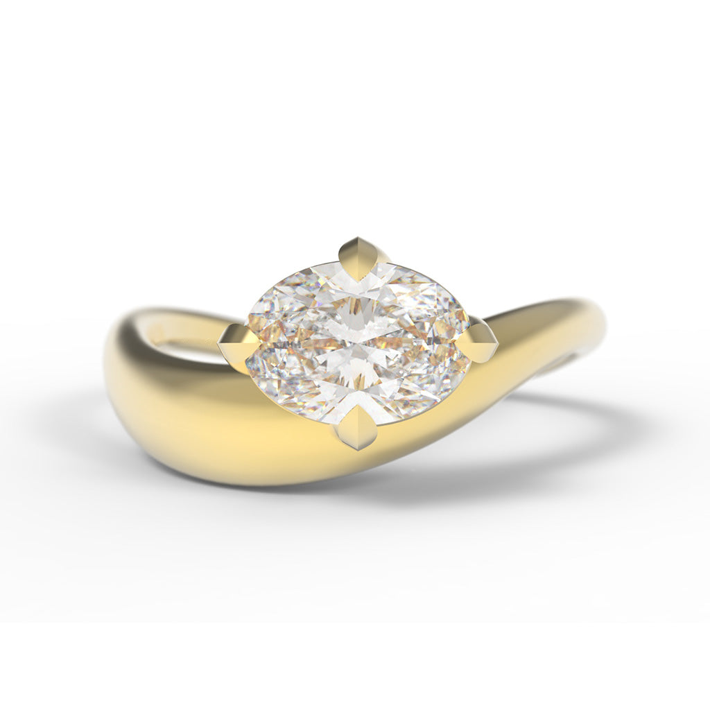 A Large Oval Diamond Ring, with a Wide Yellow Gold Band, with unique Sculptural Wave details and an East-West setting.