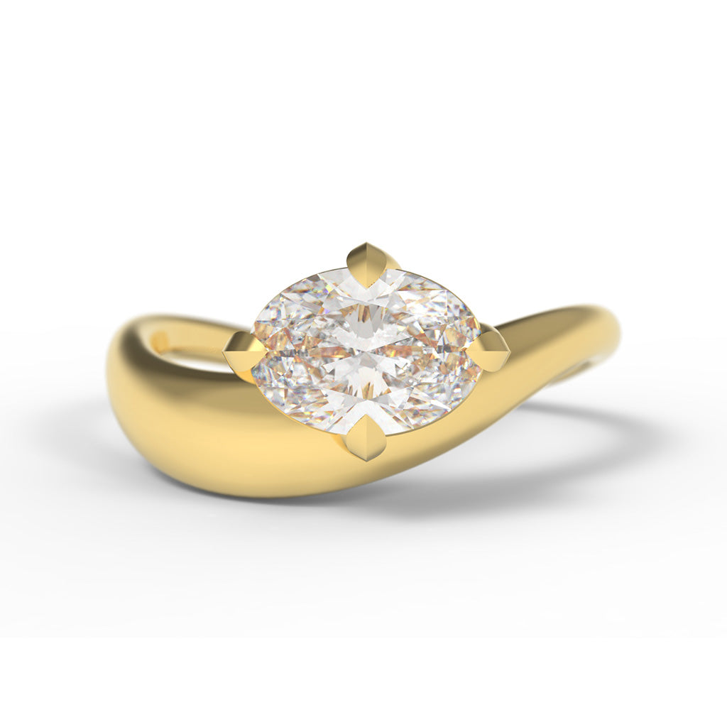 A Large Oval Diamond Ring, with a Wide Yellow Gold Band, with Sculptural Wave details and an East-West setting.