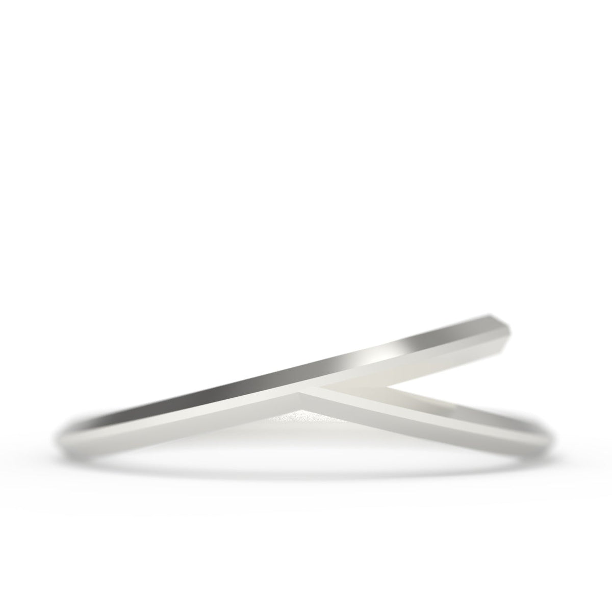 A silver band ring with a chevron branch-like design, displayed against a white background.